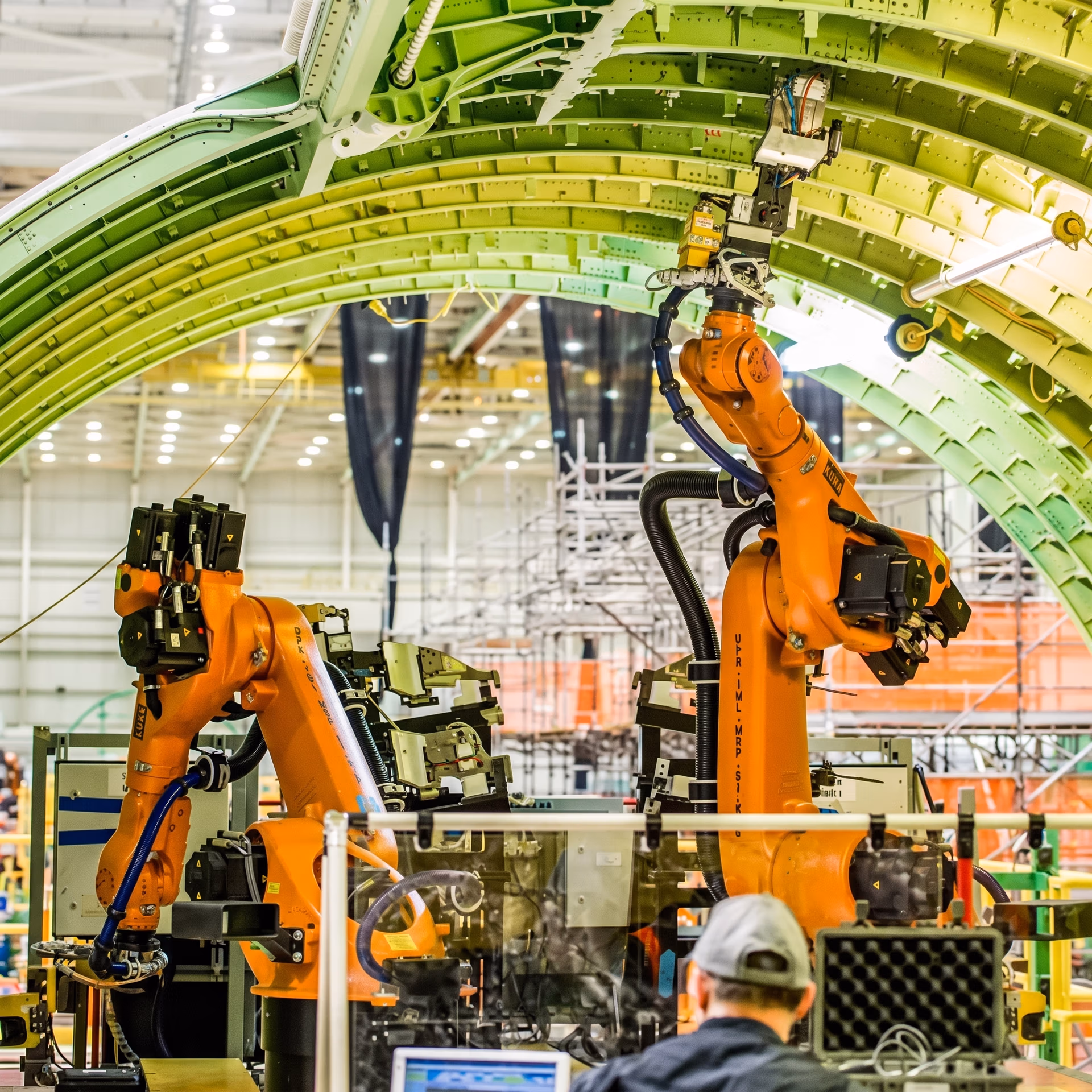 FAUB robots working on a Boeing plane’s fuselage