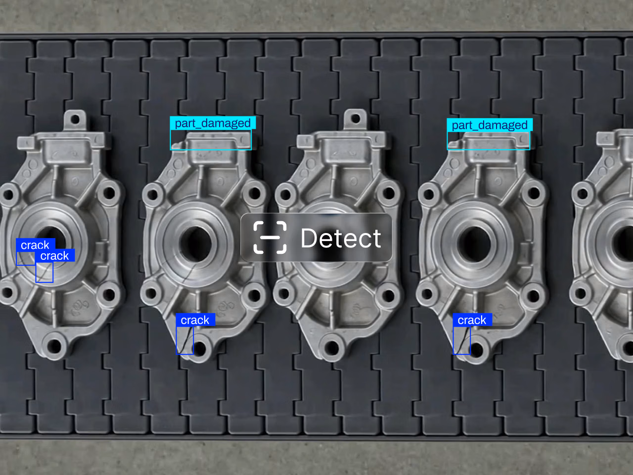 Object detection: metal castings on a conveyor belt, with bounding boxes labeled part_damaged and crack.