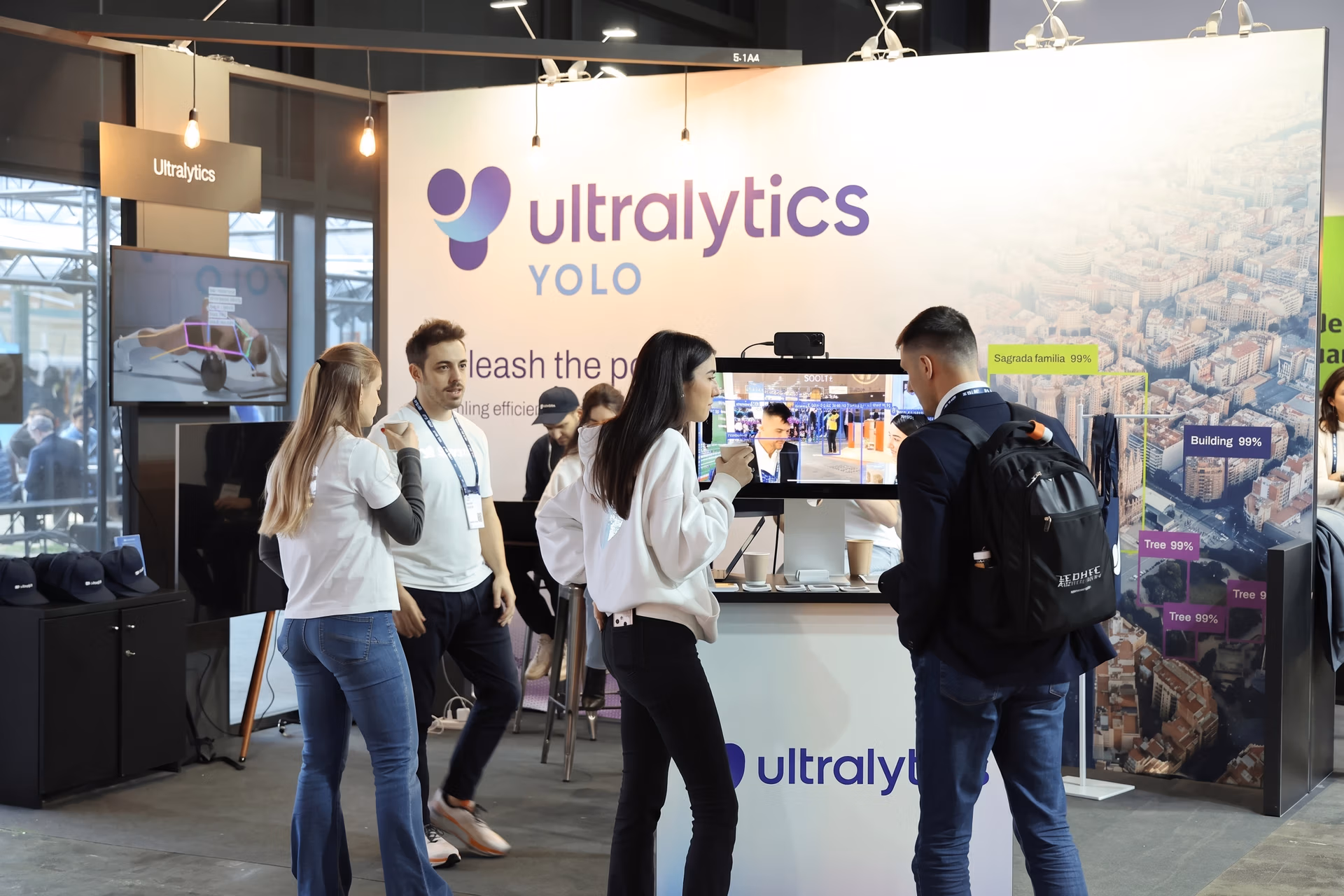 Speaking to tech enthusiasts at the Ultralytics booth