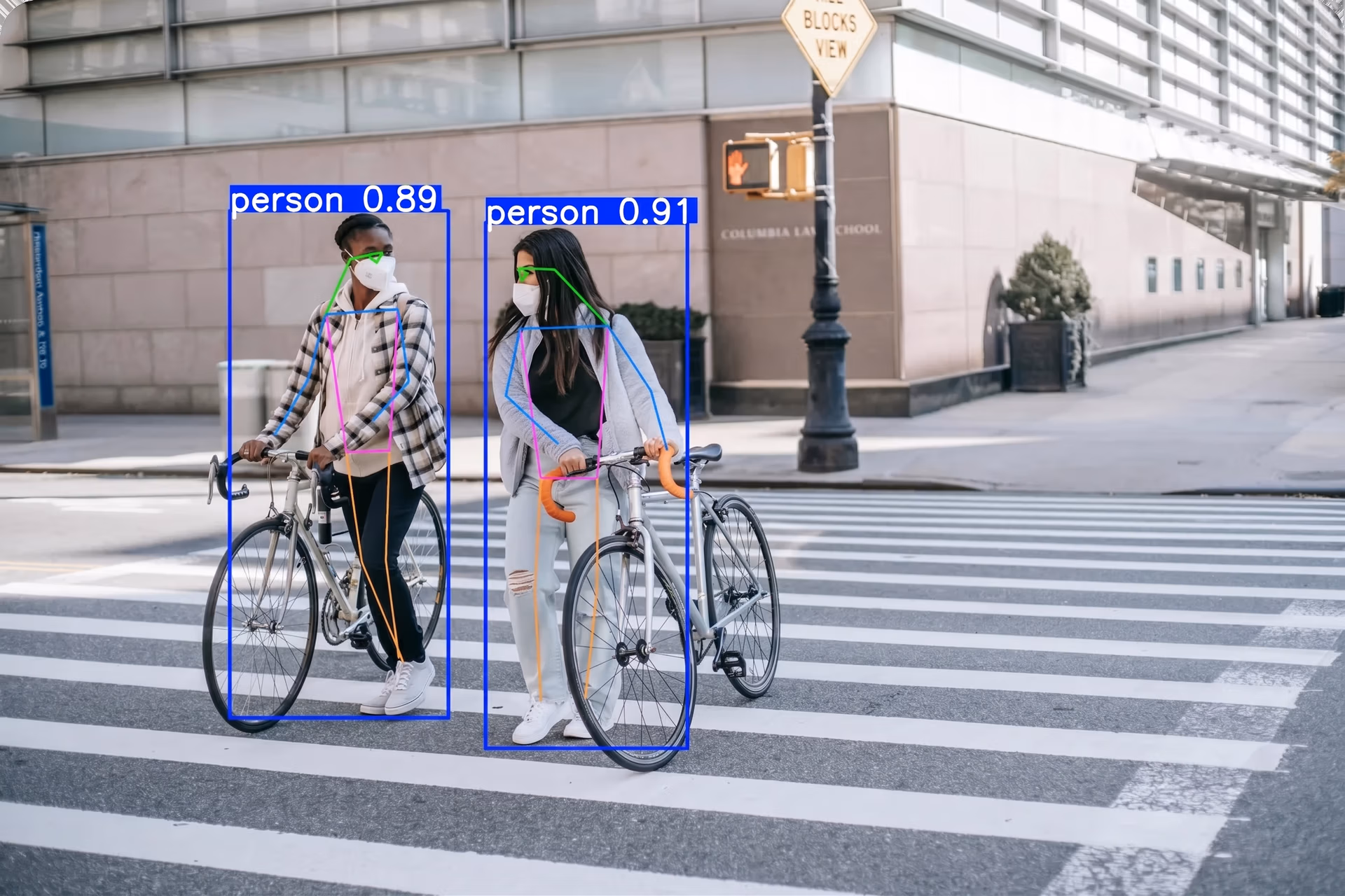 Ultralytics YOLO11 detecting pedestrians at a crosswalk