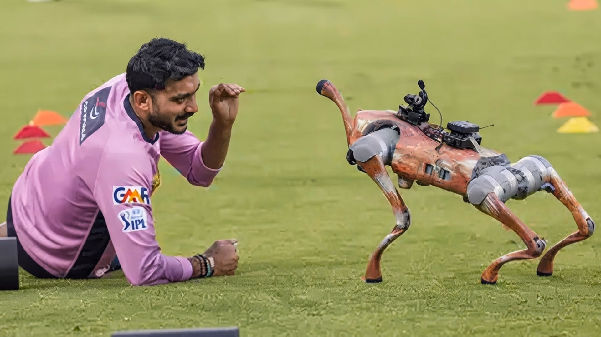 Champak interacts with a player during practice