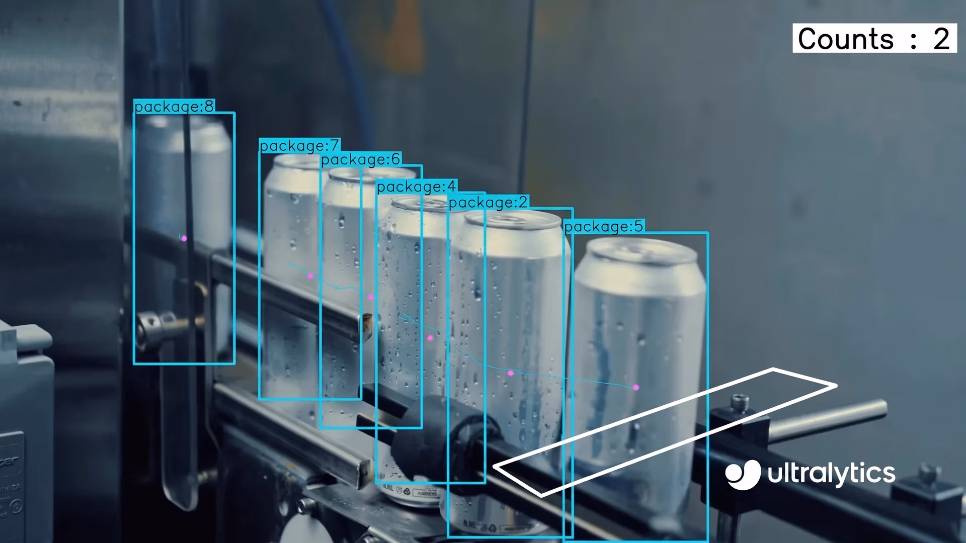 Ultralytics YOLO11 detecting defects in beverage cans on a conveyor belt