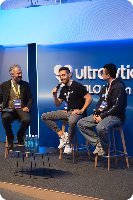 Glenn Jocher and Jing Qiu speaking on stage at YV24