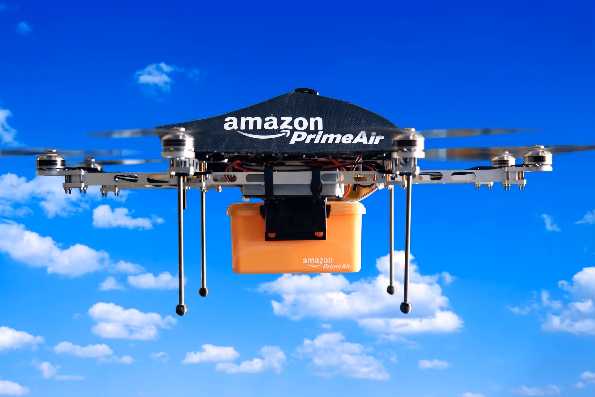 Amazon Prime Air autonomous drone delivering a package