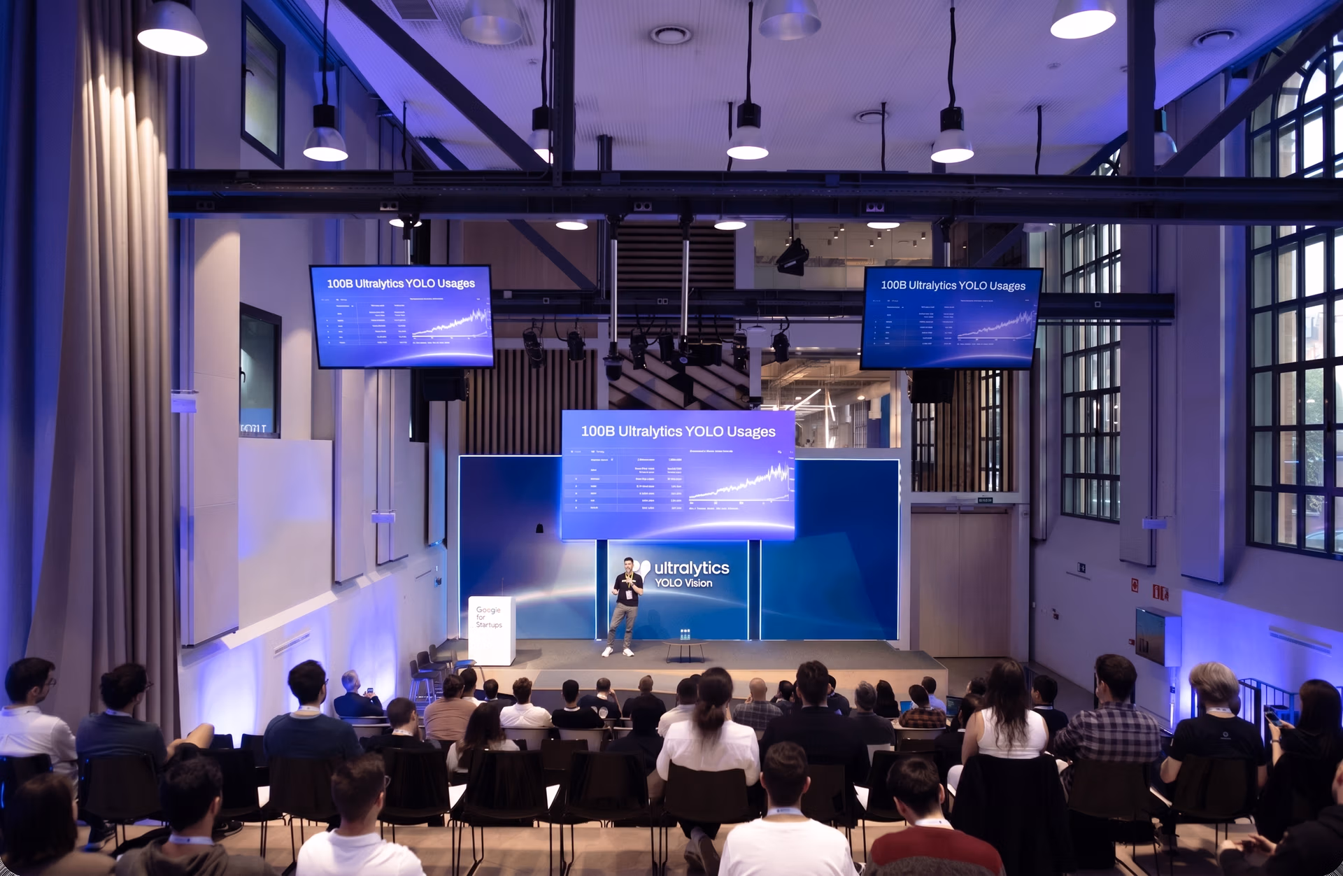 Glenn Jocher on stage announcing Ultralytics YOLO11 at YV24